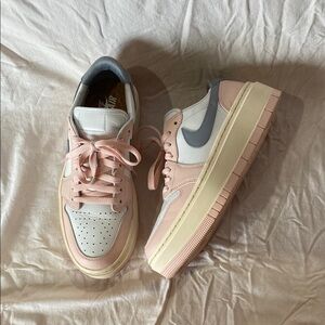 Nike Pink Sneakers with Low-Top Design and Cream Accents